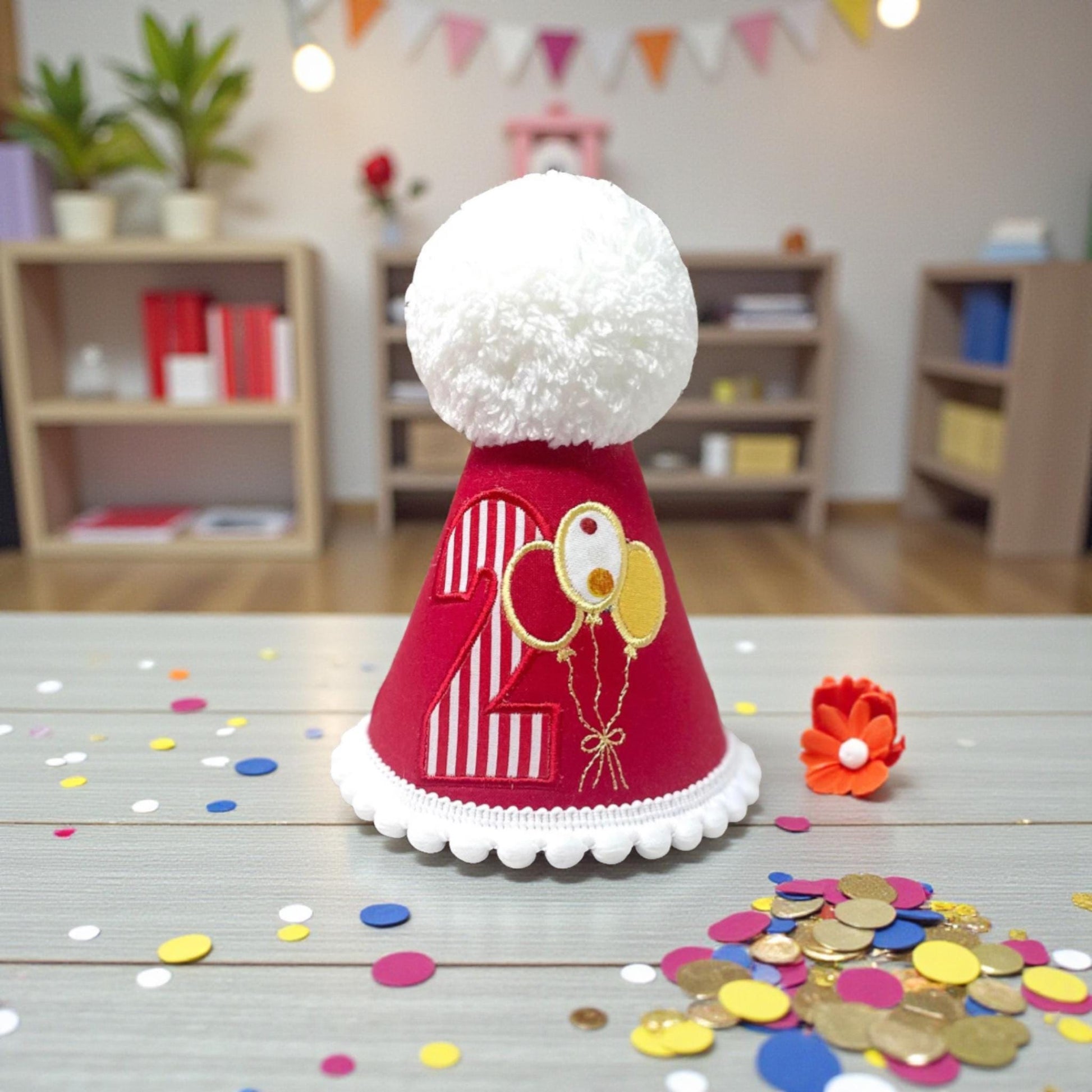 Red circus themed first birthday hat with balloon embroidery