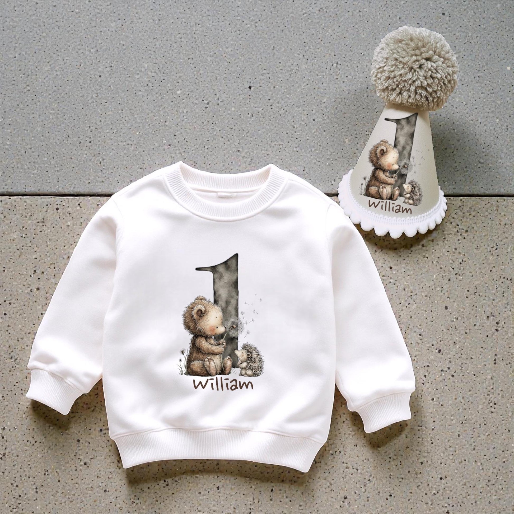 Personalised woodland first birthday outfit with printed baby sweatshirt and handmade party hat