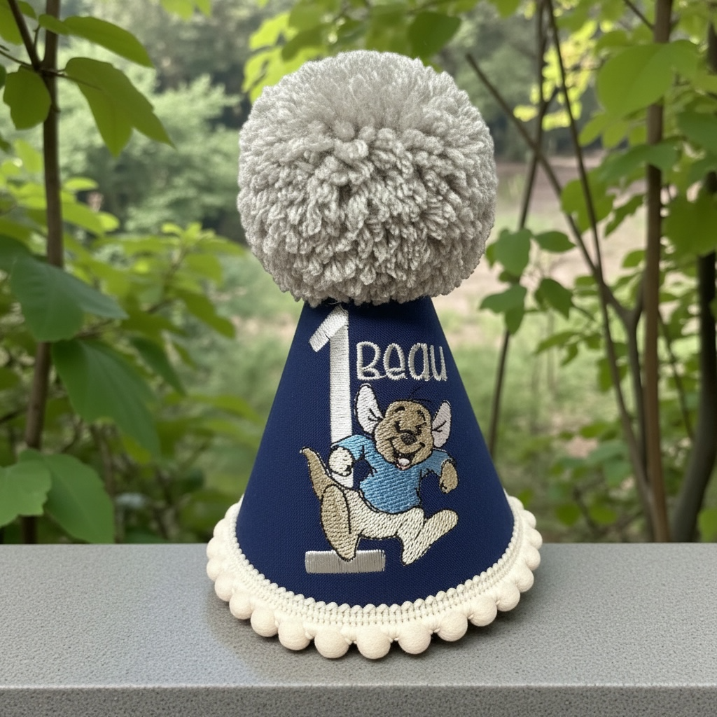 Navy blue personalised embroidered birthday hat with pom pom
