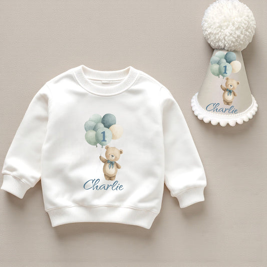 Personalised balloon bear 1st birthday printed sweatshirt with matching handmade pom-pom party hat in neutral tones