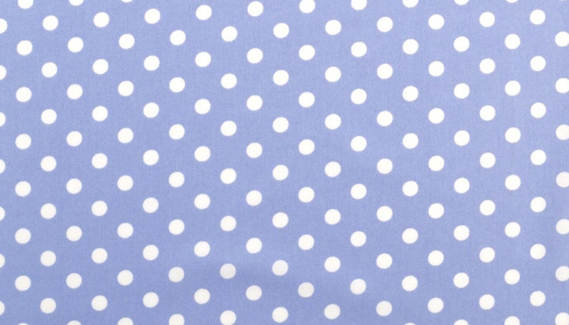 a pattern of white polka dots on a blue background.
