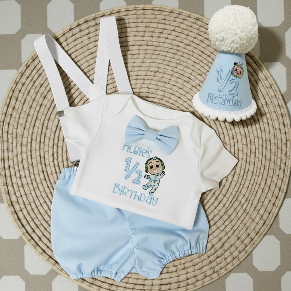 Personalised baby half birthday outfit embroidered with favourite children’s character, blue bloomers and matching 1/2 birthday hat