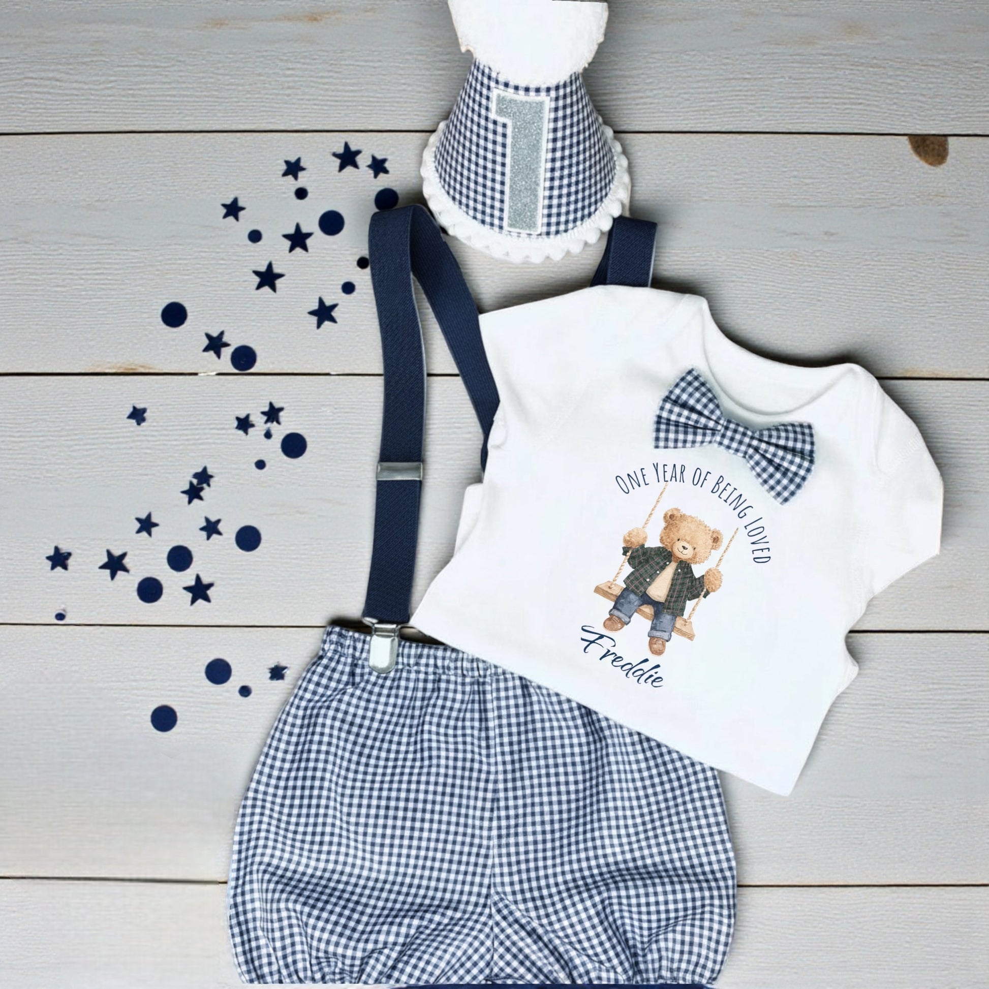 Baby boy cake smash outfit with printed teddy bear design