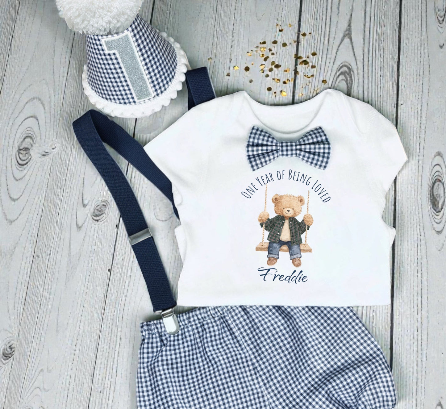 Personalised baby boy first birthday outfit with navy gingham bloomers